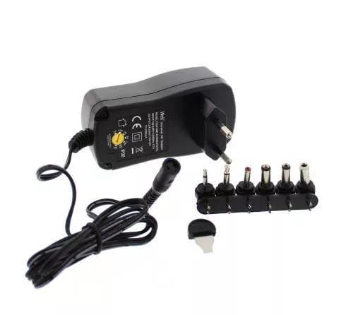 Alimentator universal in comutatie 2250mA 3-12V 2.25A 6 mufe Well